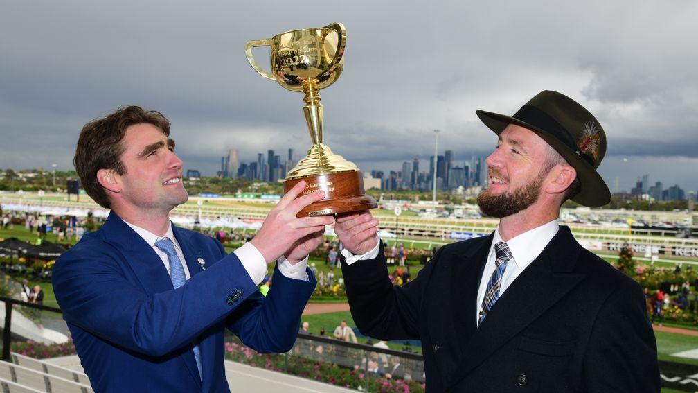 MELBOURNE, AUSTRALIA - NOVEMBER 01: Trainers David Eustace and  Ciaron Maher pose with the Melbourne Cup after Gold Trip won Race 7, the Lexus Melbourne Cup, during 2022 Lexus Melbourne Cup Day at Flemington Racecourse on November 01, 2022 in Melbourne, A