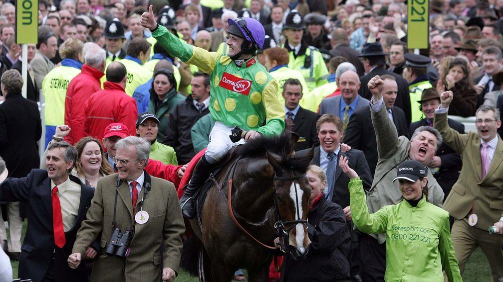 Glory days: the Manor Farm team in full flight after Kauto Star had regained his Gold Cup crown in 2009