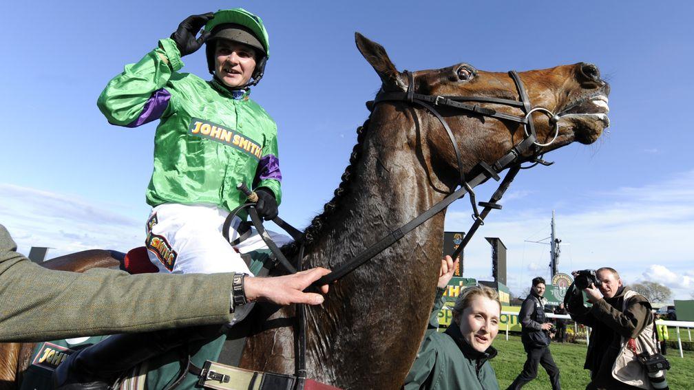Liam Treadwell celebrates his 2009 Grand National victory on Mon Mome