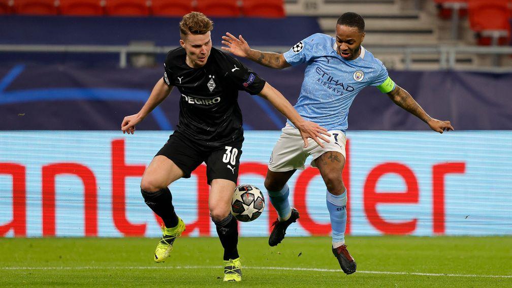 Raheem Sterling (right) competes for the ball during City's first-leg win over Gladbach