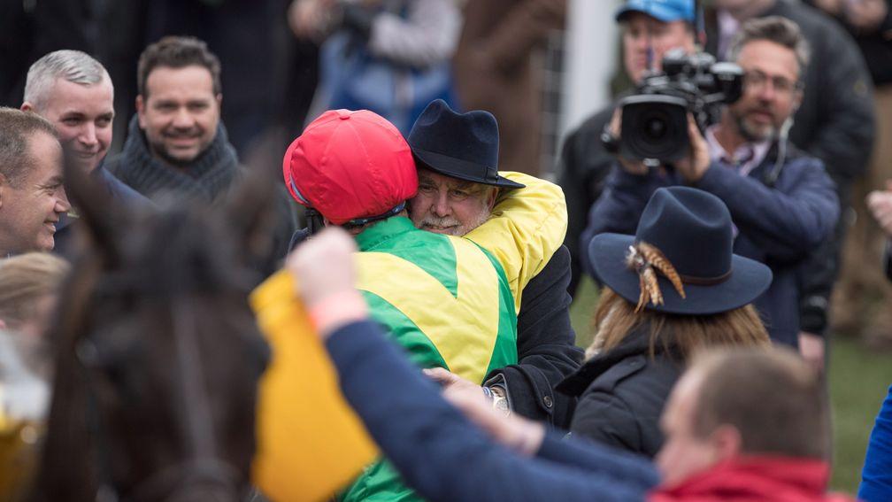 Alan Potts and Robbie Power share a moment after Sizing John's Gold Cup win