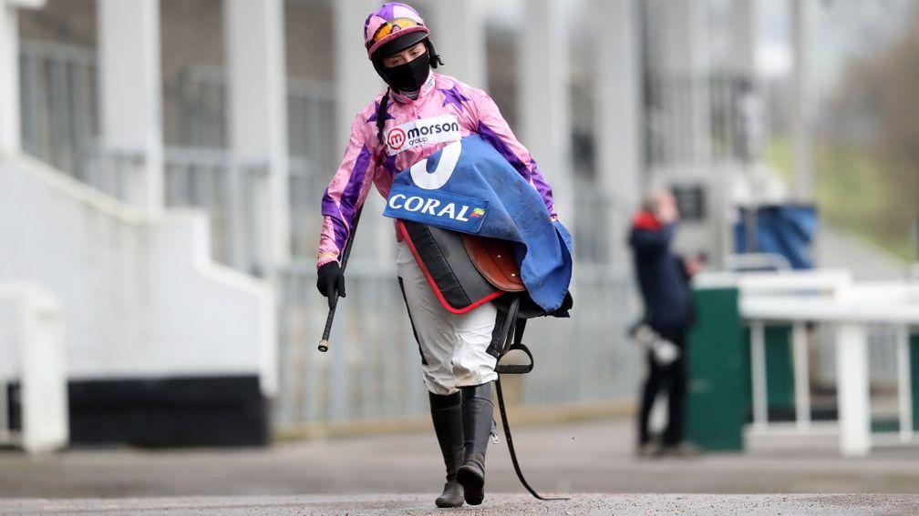 Bryony Frost makes her way back to the weighing room after winning on Storm Arising