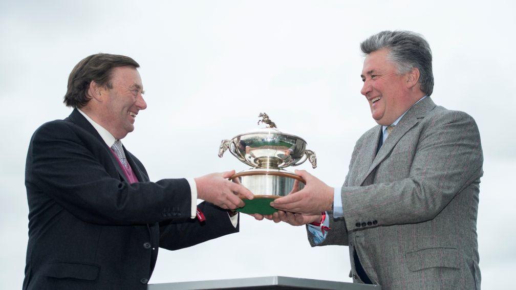 Nicky Henderson and Paul Nicholls hold the trainers championship trophyAintree 6.4.17 Pic: Edward Whitaker