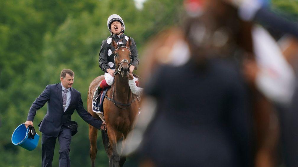 An exultant Frankie Dettori celebrates Oaks victory aboard the well-bred Anapurna