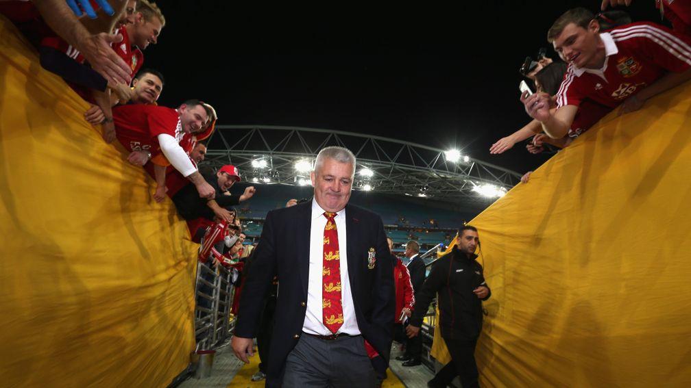 Warren Gatland is cheered off the pitch after the British & Irish Lions' Test series victory in Australia in 2013