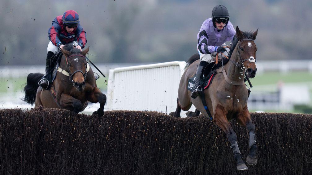Stage Star (Harry Cobden,right) leads over the 2nd last fence and beats Datsalrightgino (Gavin Sheehan) in the 2m 4.5f handicap chase Cheltenham 28.1.23 Pic: Edward Whitaker