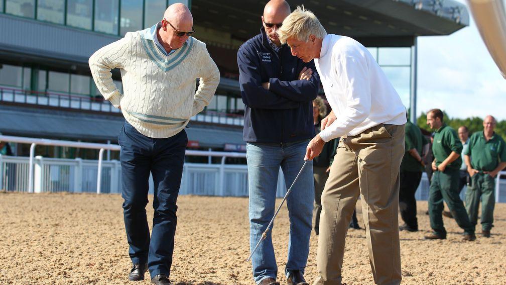 Jim Allen (centre) with Michael Dickinson (right) inspect the new Tapeta surface at Wolverhampton four years ago
