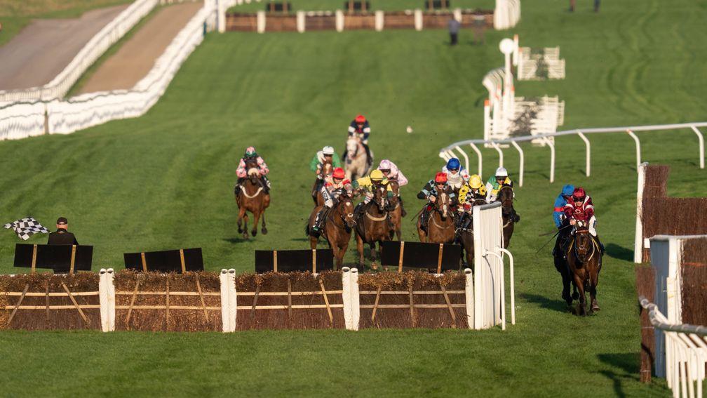 I Like To Move It (Sam Twiston-Davies) leads around the dolled off final flight in the Greatwood Hurdle