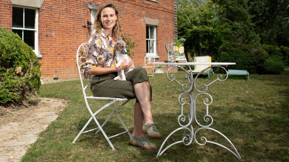 The ITV racing presenter Francesca Cumani with her new lurcher puppy at her farmhouse near Newmarket 21.7.20 Pic: Edward Whitaker