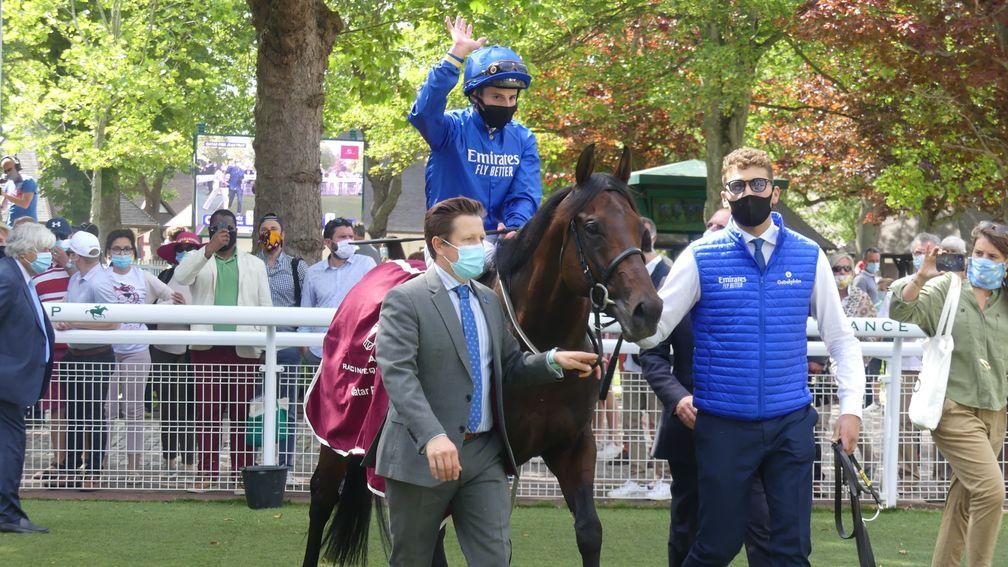 Pinatubo and William Buick return to the winner's enclosure after scoring in the Prix Jean Prat at Deauville