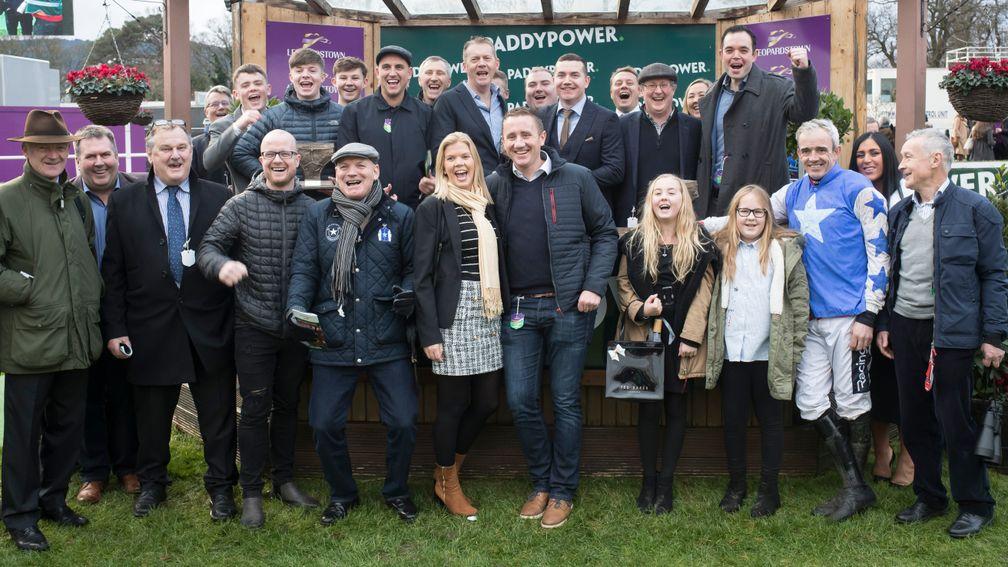 Willie Mullins and Ruby Walsh join the Supreme Racing Club members for the celebrations after Aramon's Future Champions Novice Hurdle victory at Leopardstown