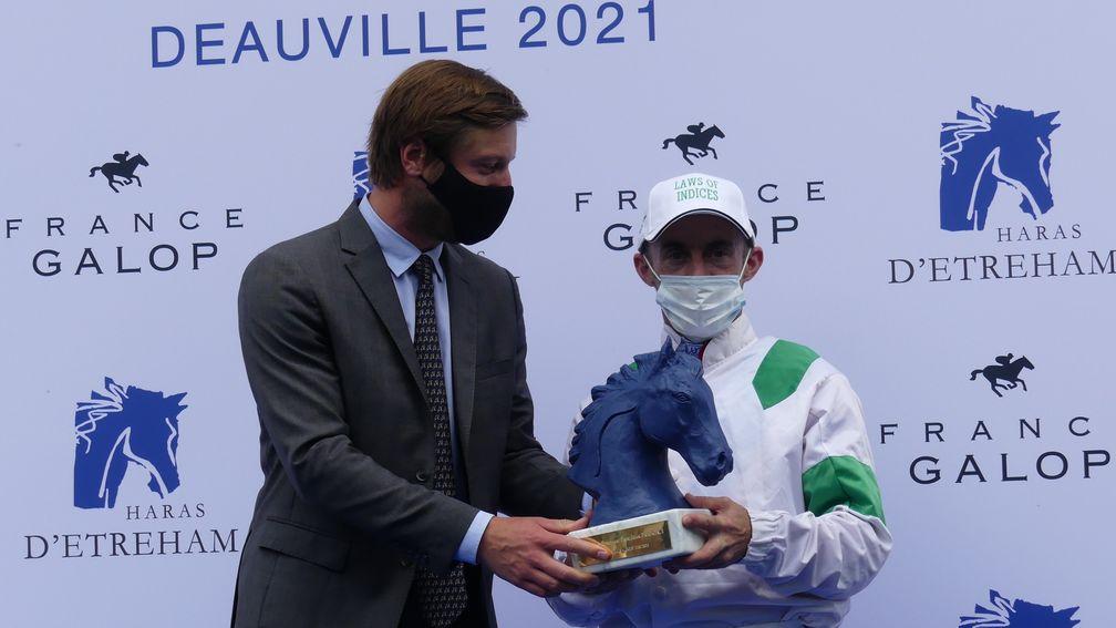 Olivier Peslier is presented with his prize after the Jean Prat