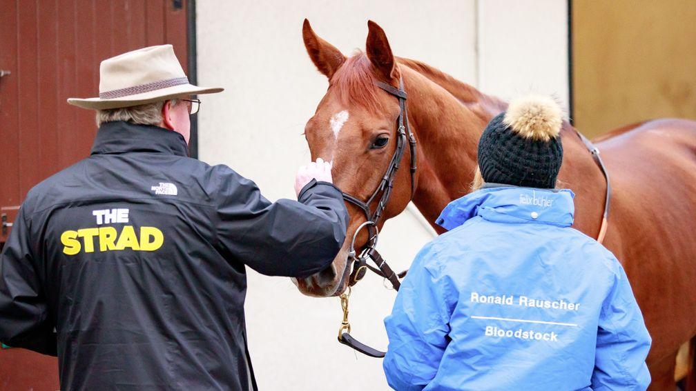 Jeremy Brummitt, decked out in a jacket bearing the name 'The Strad', inspects a potential purchase in Deauville