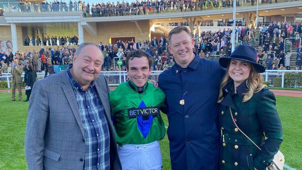 Scoop6 players Tony Causer (left) and James Walsh and his wife Gemma with Ga Law's jockey Johnny Burke at Cheltenham last week