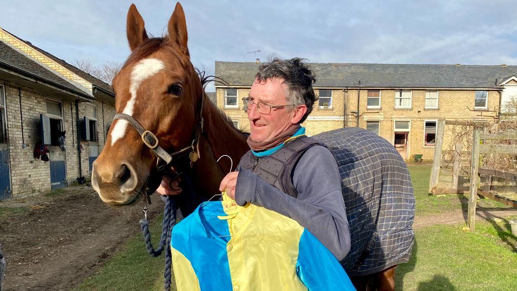 Trainer John Berry with Turn Of Phrase, who sported the Ukraine silks on Monday night