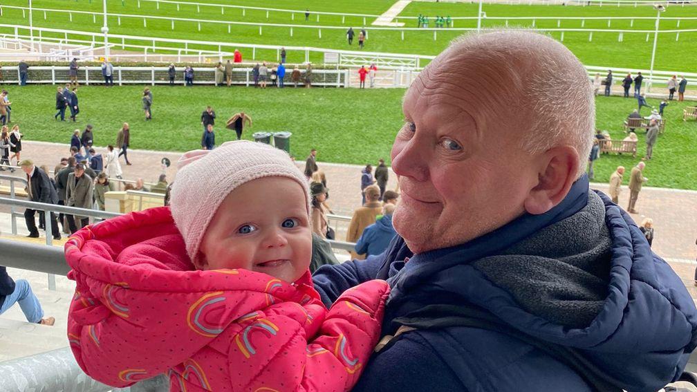 Mick Smith, pictured with granddaughter Elsie, during a visit to Cheltenham