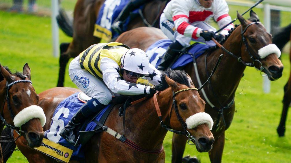 YORK, ENGLAND - MAY 11: Connor Beasley riding Dakota Gold (white cap/stars) win The Churchill Tyres Handicap at York Racecourse on May 11, 2022 in York, England. (Photo by Alan Crowhurst/Getty Images)
