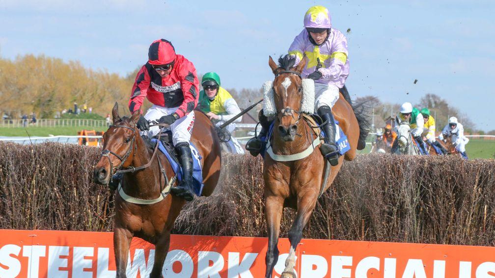 Takingrisks (right) and Crosspark do battle in the Scottish Grand National