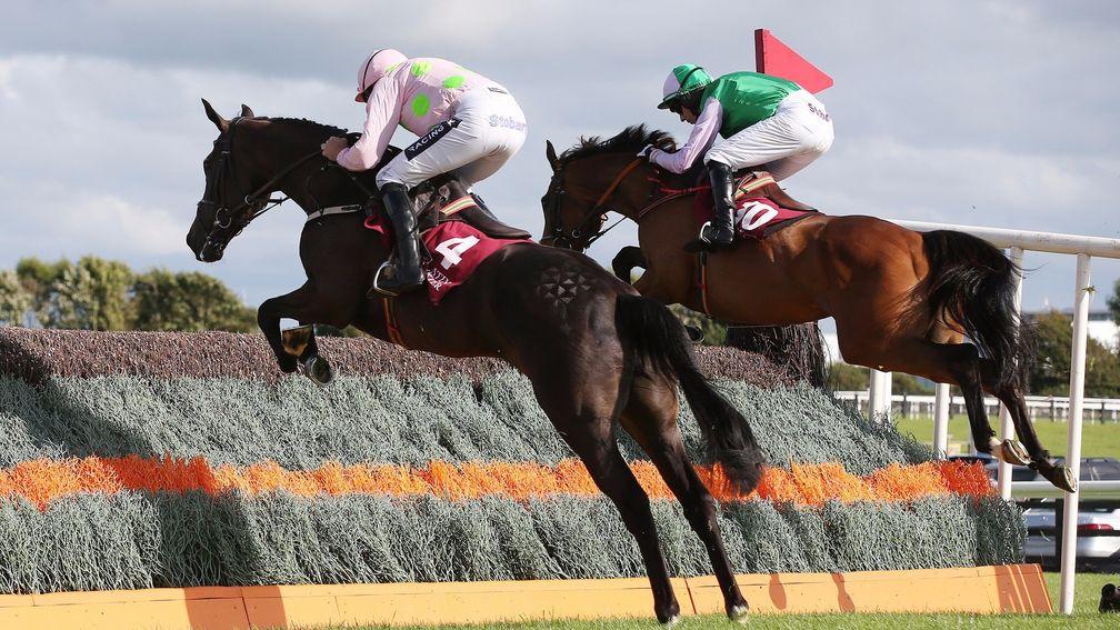 Three Wise Men and Noel Fehily (right) lead Bamako Moriviere and Ruby Walsh en route to Galway glory