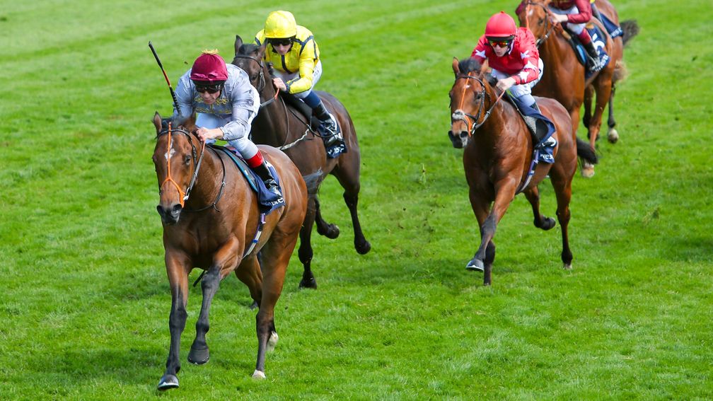 Baitha Alga and Frankie Dettori win the 2014 Woodcote Stakes for Richard Hannon