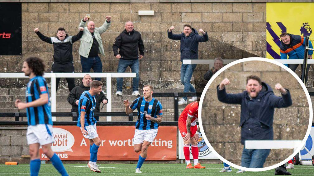 Steve Palmer (top, centre) joins in with the celebrations after Merthyr Town equalise against Poole. Photo: Ian Middlebrook