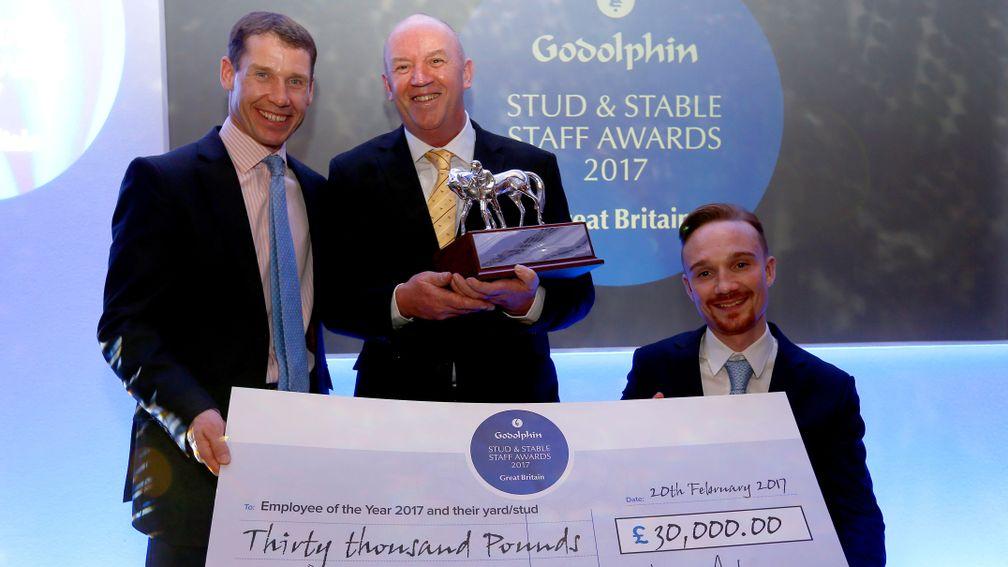 Richard Johnson (left) and Freddy Tylicki presenting Terry Doherty with the Employee of the Year Award
