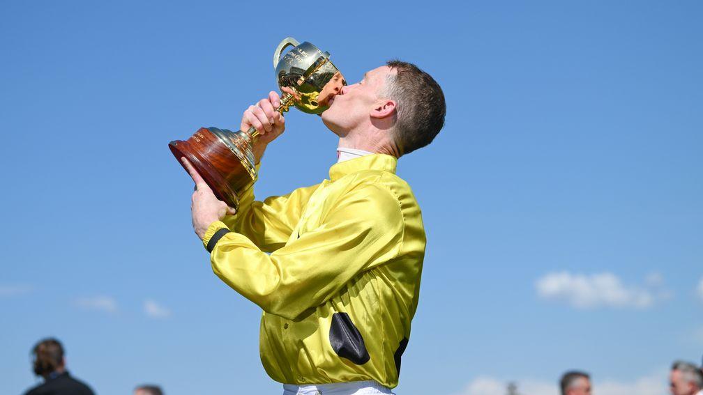 Mark Zahra lifts the Melbourne Cup trophy for a second year running