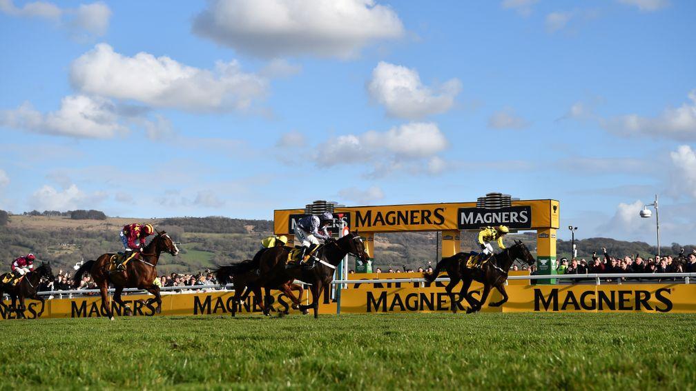 CHELTENHAM, ENGLAND - MARCH 13: Paul Townend riding Al Boum Photo wins the Magners Cheltenham Gold Cup Chase (Grade 1) (Class 1) at Cheltenham Racecourse on March 13, 2020 in Cheltenham, England. (Photo by Dan Mullan/Getty Images)