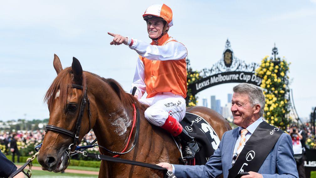 Craig Williams celebrates a first Melbourne Cup victory aboard Vow And Declare