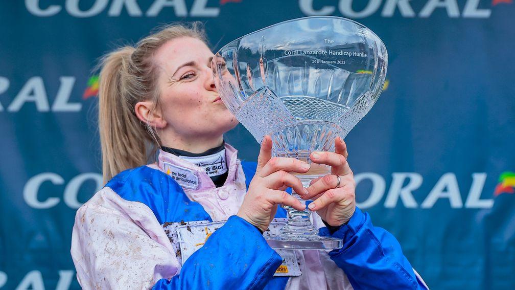 Kiss of victory: Bridget Andrews lands a smacker on the Lanzarote Hurdle trophy