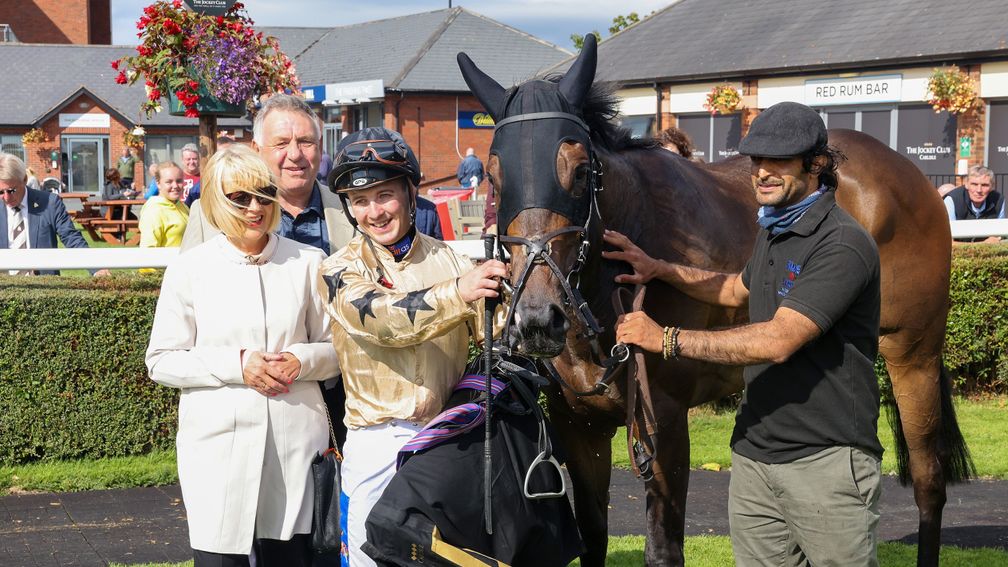 Happy connections of Runninwild after his win in the 6f handicap