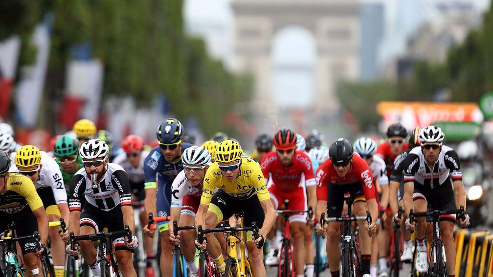 Chris Froome tasted glory in Paris again on Sunday