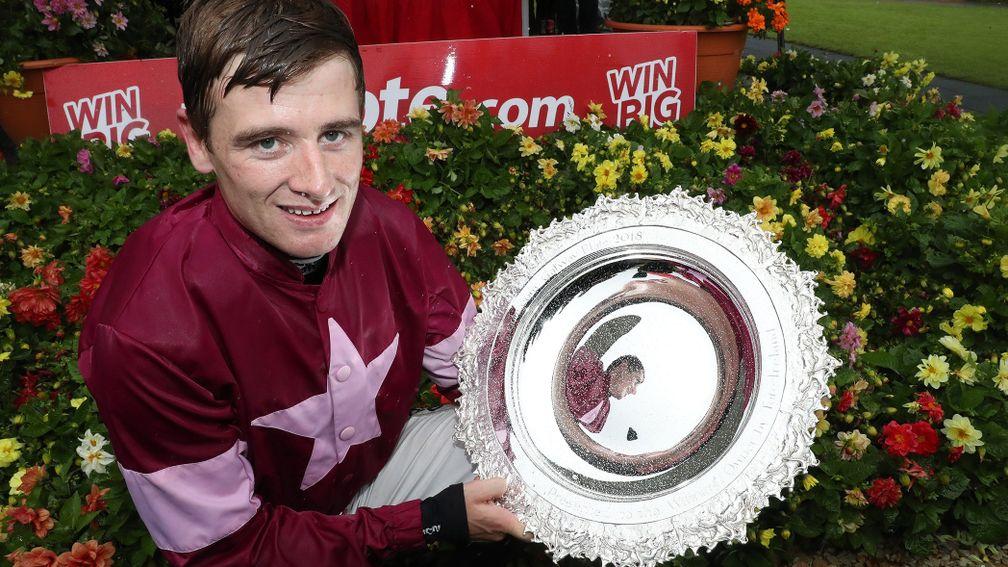 Wednesday: Mark Enright celebrates with the Galway Plate after victory on Clarcam – the jockey’s second win of the day