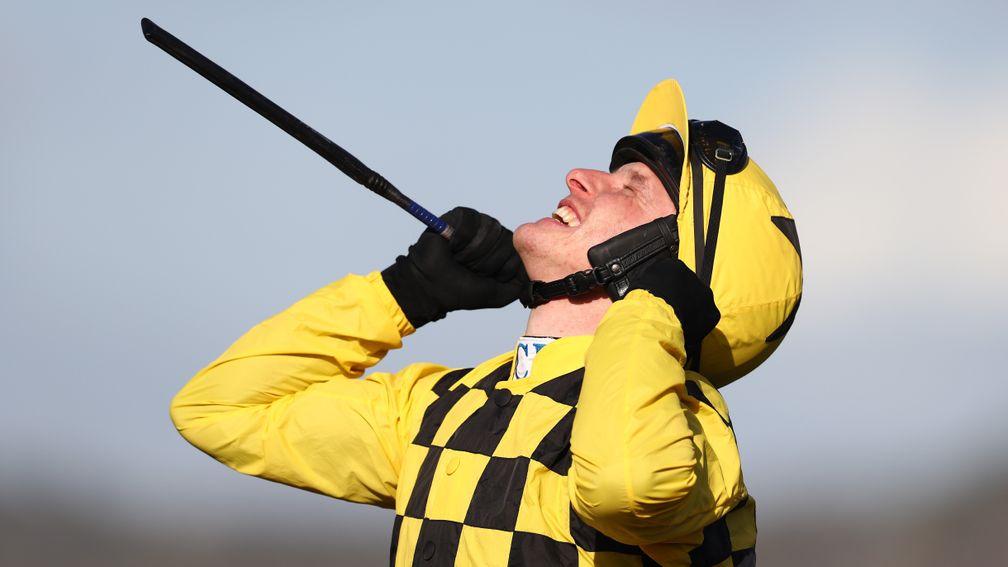 CHELTENHAM, ENGLAND - MARCH 13: Paul Townend riding Al Boum Photo celebrates winning the Magners Cheltenham Gold Cup Chase (Grade 1) (Class 1) at Cheltenham Racecourse on March 13, 2020 in Cheltenham, England. (Photo by Michael Steele/Getty Images)