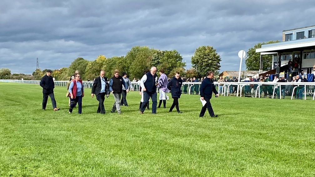 The inspection party return before abandoning racing at Huntingdon. Concerns were raised after horses began slipping in the first two races