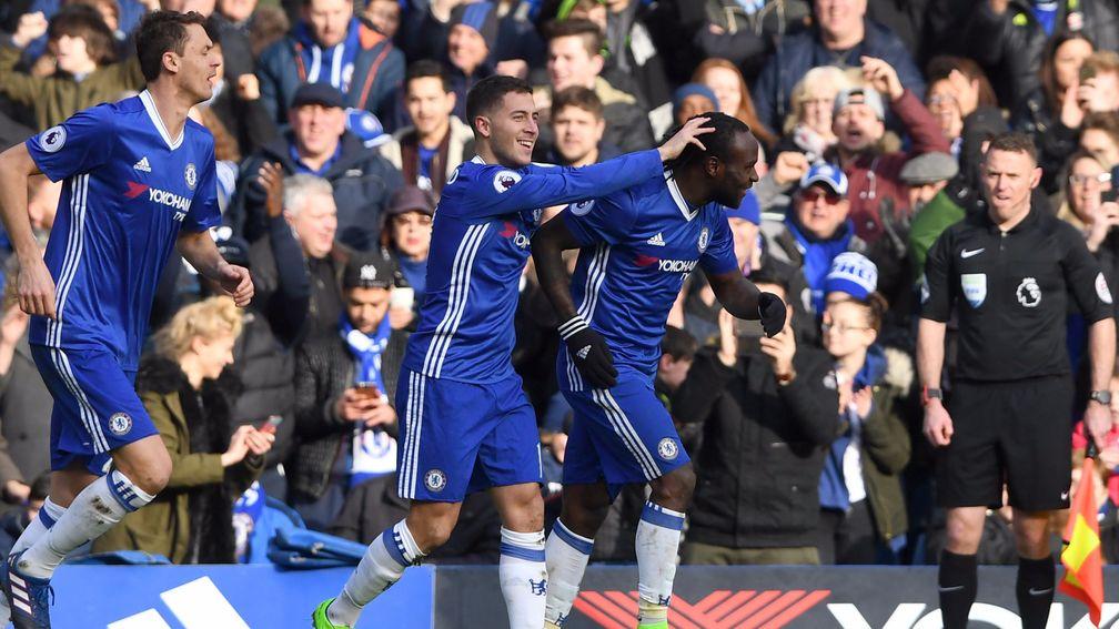 Eden Hazard celebrates after a stunning solo goal which helped to gain revenge on Arsenal