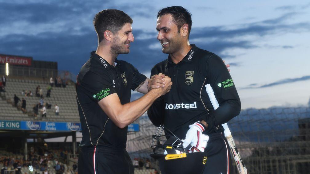 Colin Ackermann and Mohammad Nabi celebrate Leicestershire's win at Old Trafford