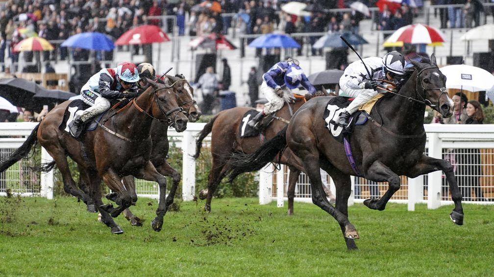 Powering clear: Raising Sand hits the front to win the Ascot Challenge Cup