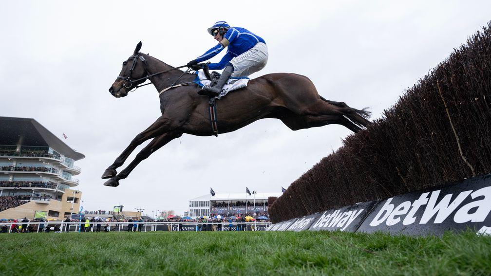 Energumene (Paul Townend) jumps the last fence to win the Champion Chase