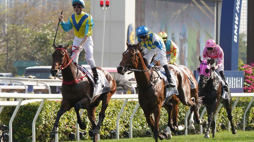 Massive Sovereign (left) crosses the winning line in front to win the Hong Kong Derby