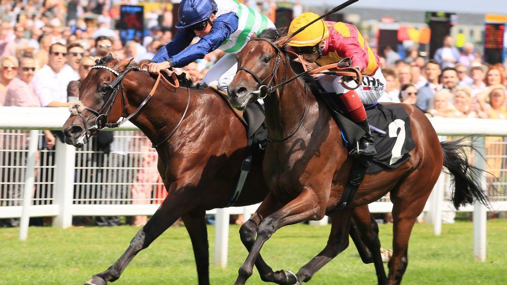 Masekela and William Buick (left) edge out David Egan and Bayside Boy in the Denford Stakes at Newbury