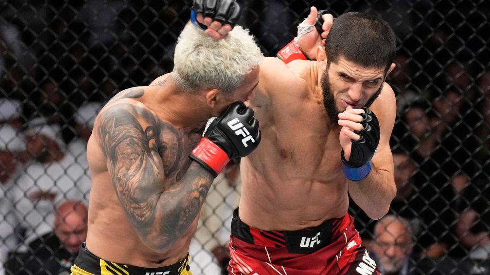 Islam Makhachev (right) in action against Charles Oliveira