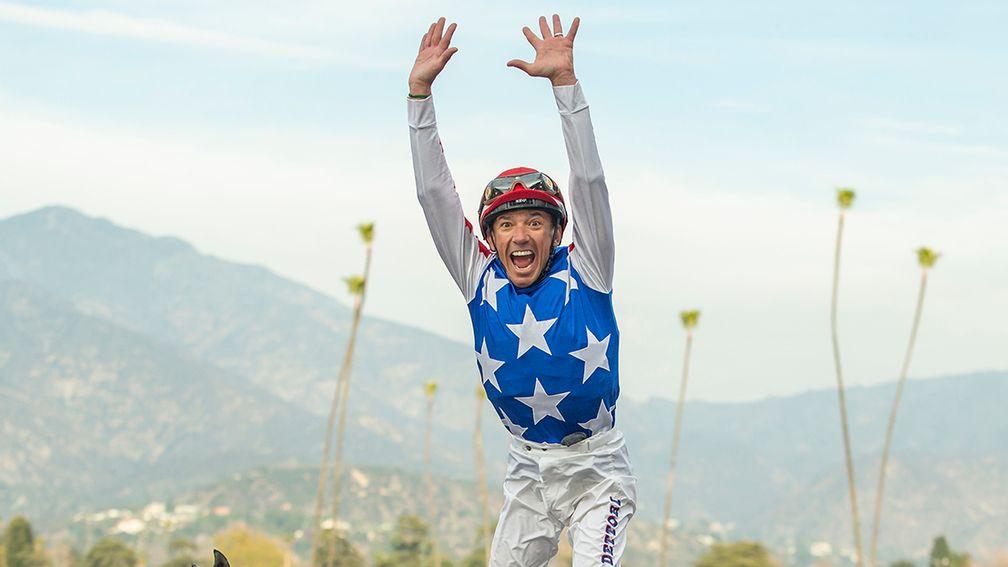 Frankie Dettori performs his trademark flying dismount at Santa Anita