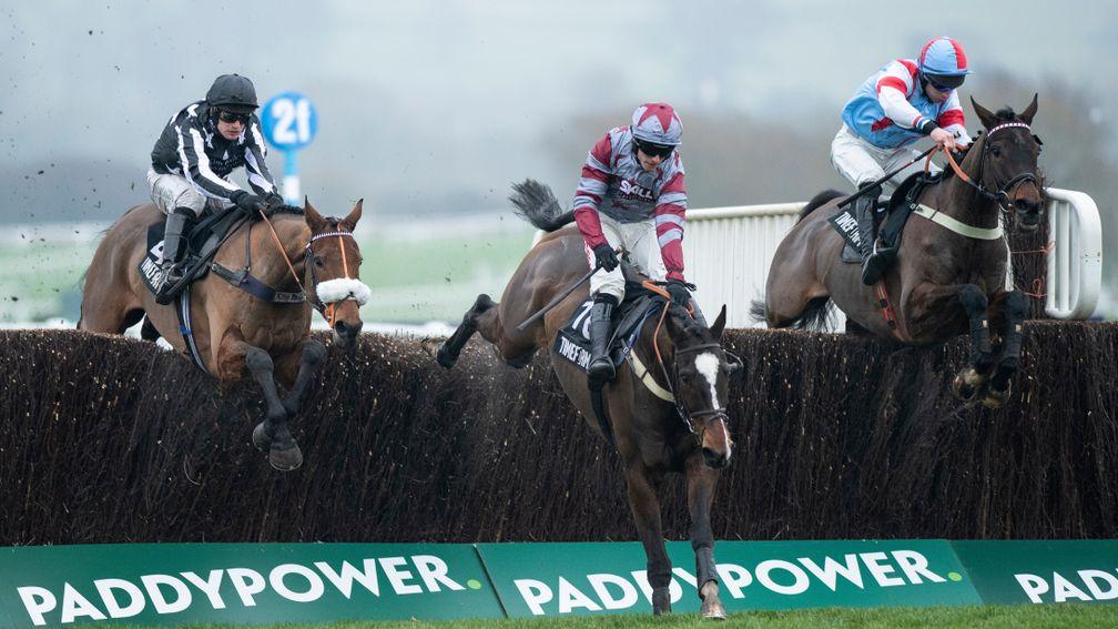 Simply The Betts (right) jumps the 2nd last fence and beats Imperial Aura (left) and On The Slopes in the 2m 4f novices handicap chaseCheltenham 25.1.20 Pic: Edward Whitaker