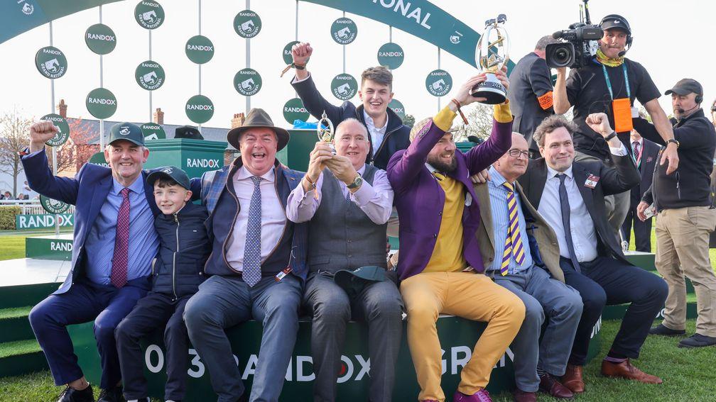 Joy for the Ramblers as they proudly show off their Grand National trophy