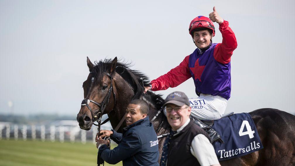 Shane Foley gives a thumbs-up after landing the Irish 2,000 Guineas on Romanised