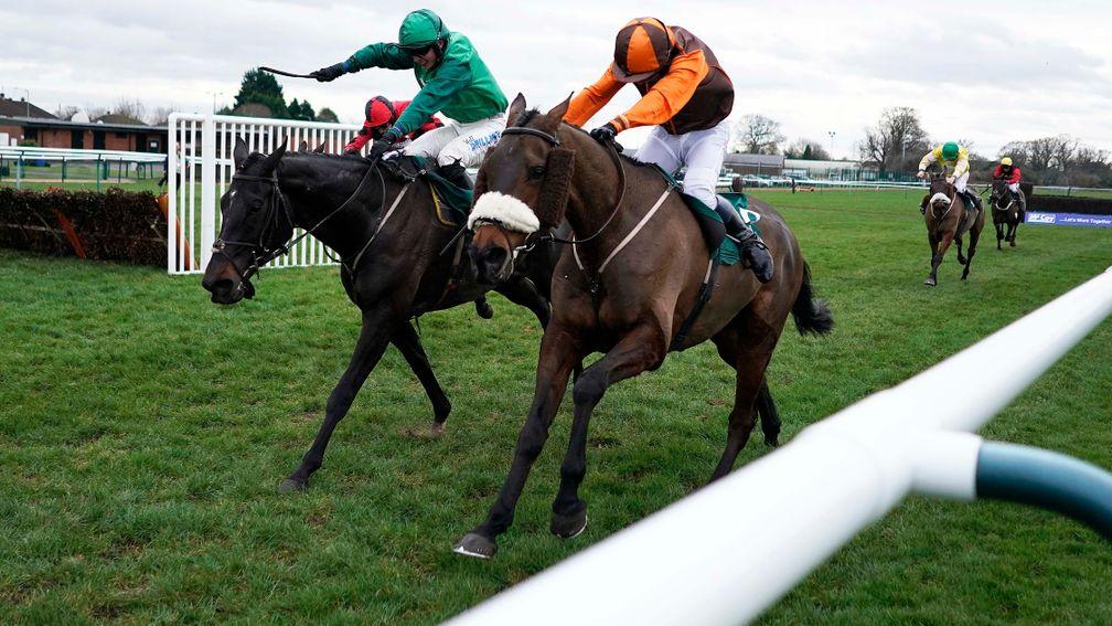 Impulsive Star and Sam Waley-Cohen (right) outbattle Calett Mad to land the Classic Chase at Warwick