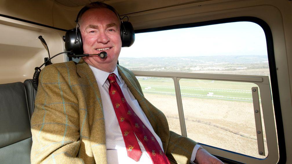 Dai Walters, pictured heading to Ffos Las in his helicopter, will maintain an association with the course as honorary chairman