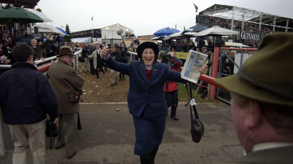 Henrietta Knight runs into the arms of Terry Biddlecombe after Best Mate with Jim Cullot win the Gold Cup for a third time at Cheltenham 18th March 2004 Mirrorpix