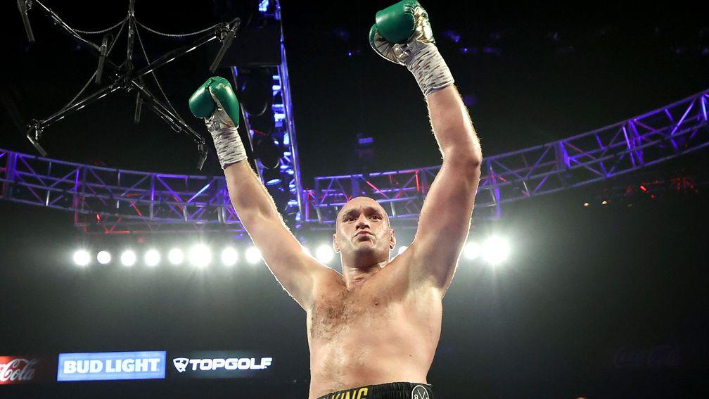Tyson Fury celebrates after knocking down Deontay Wilder in Las Vegas